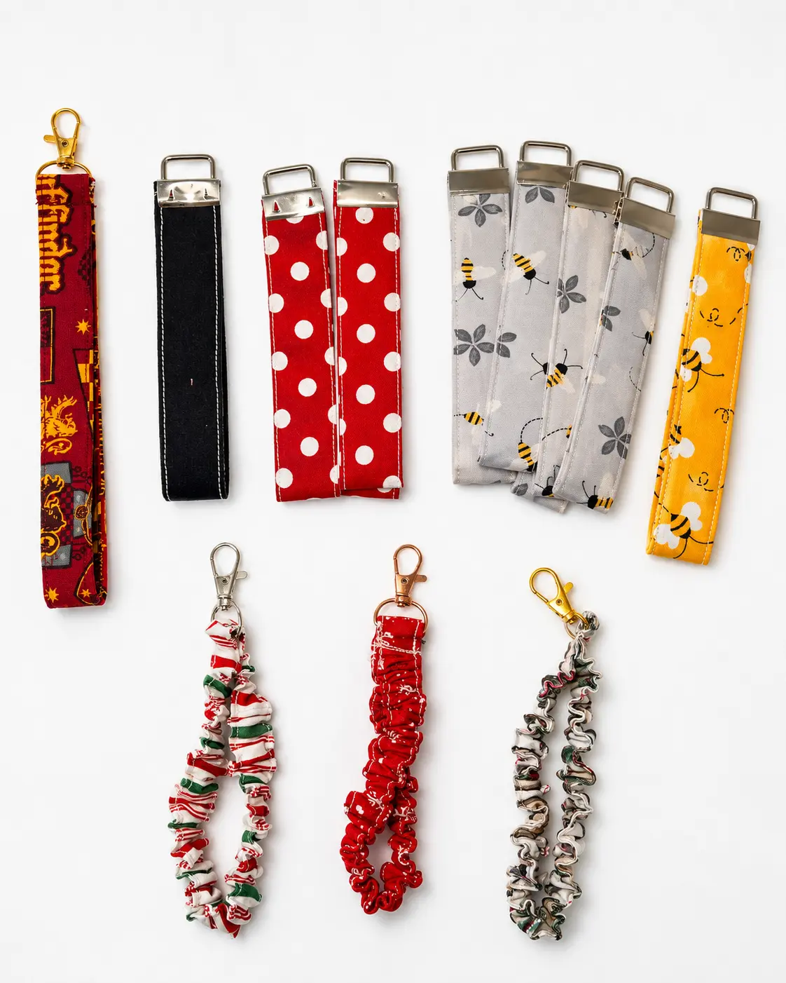 Coordinated fabric wristlet and key-fob accessories in holiday and patterned fabrics with metal keychain hardware
